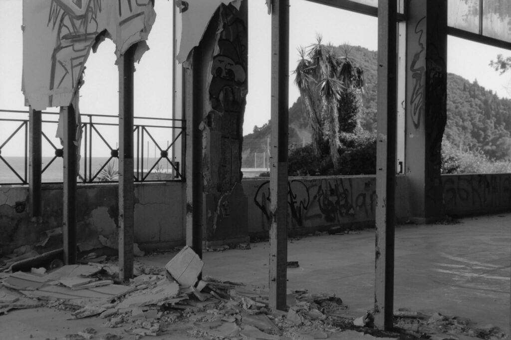 An image of a crumbling wall in an abandoned hotel